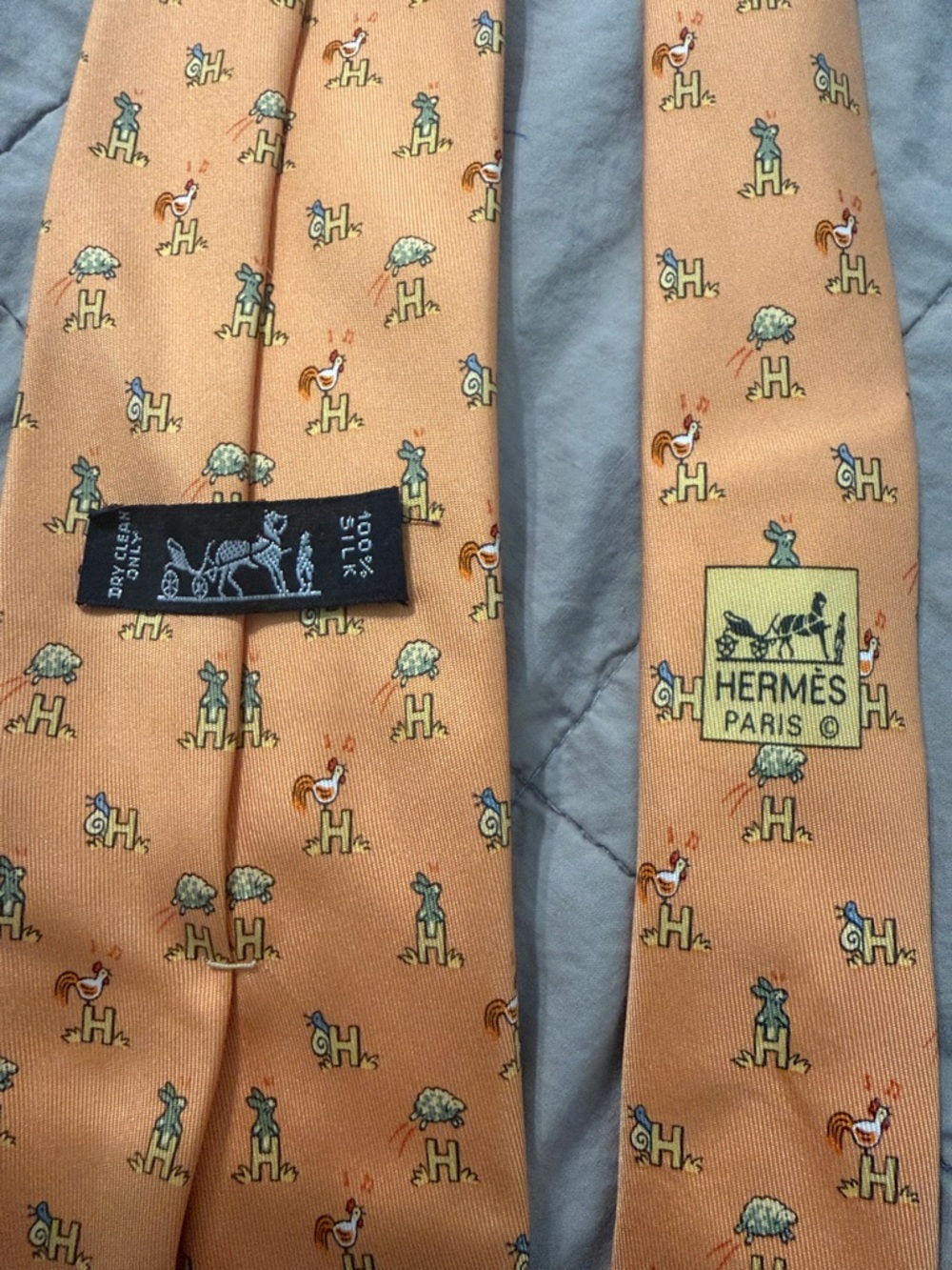 Hermes Orange Silk Tie with Mini Animal Motifs